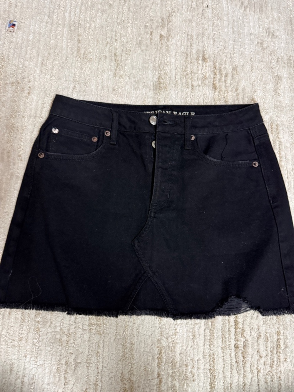 American Eagle Outfitters Black Mini Denim Skirt with Distressed Hem